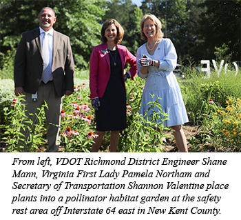 VDOT Richmond District Engineer Shane Mann, Virginia First Lady Pamela Northam, Secretary of Transportation Shannon Valentine place plants into a pollinator habitat garden at the safety rest area off Interstate 64 east in New Kent County.